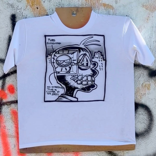 White short-sleeve tee featuring a framed black cartoon portrait with “Pure Sunshine” lettering.